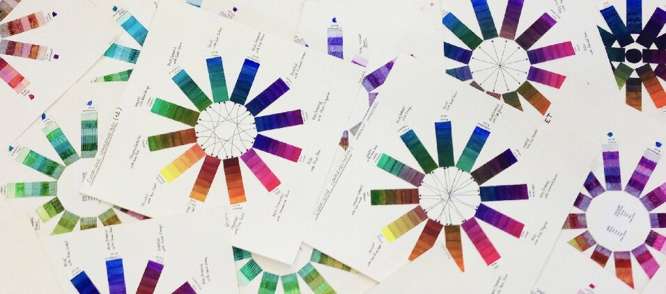 Painted assortment of color wheel charts