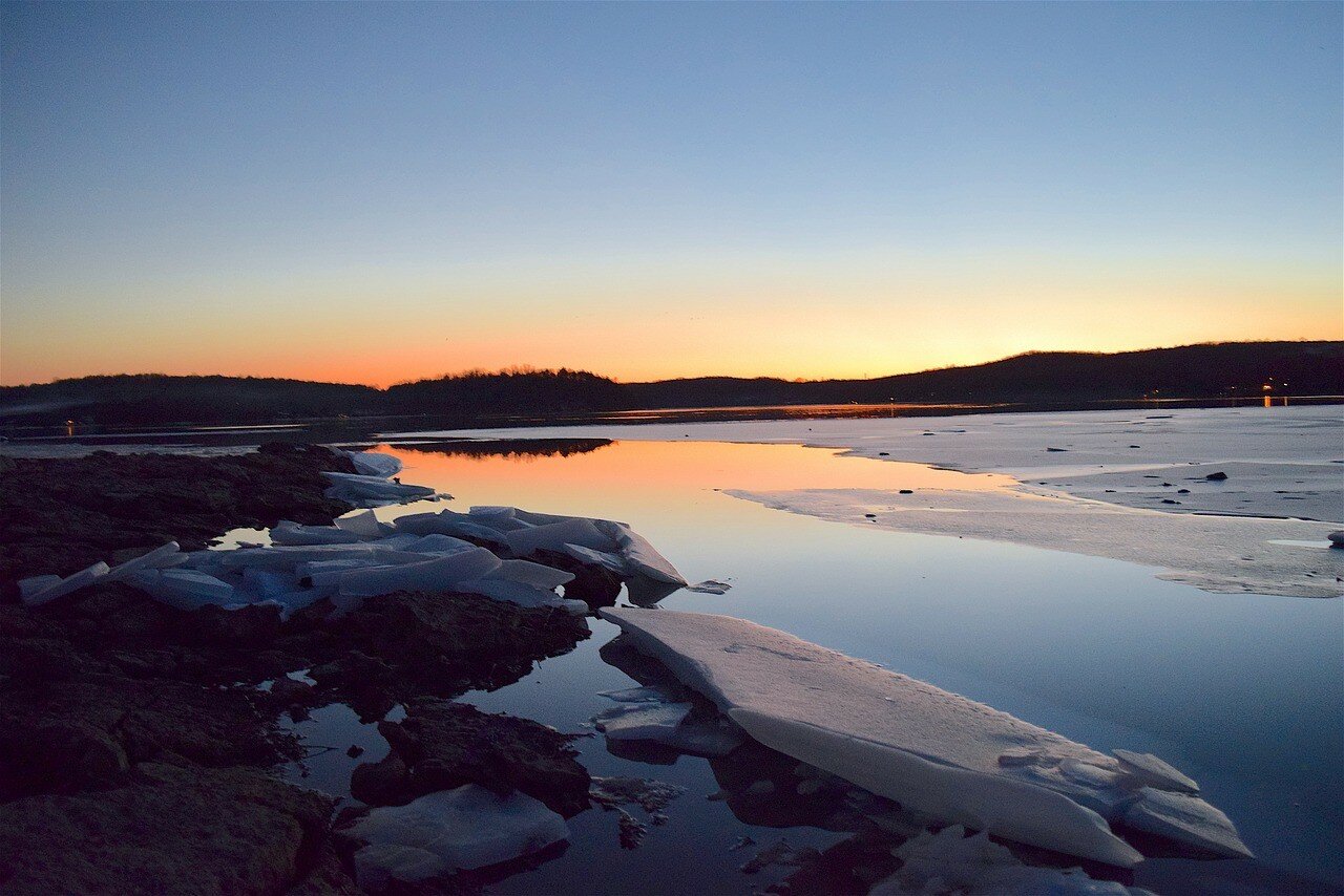 Sunset photo of a lake in blue and orange complementary colors